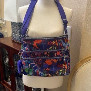 Kipling purple, coral, multi colored handbag
